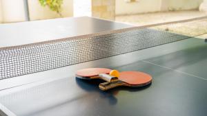 a skateboard laying on top of a conveyor belt at The Villa - Private Pool near Tanjung Rhu Beach by WOW Holiday Homes in Kuah