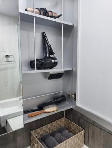 a walk in closet with a drawer with a shoe organizer at 대구 동성로 스타비앤비 in Hyomoktong-Ilgu +14 photos
