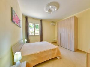 a bedroom with a bed and a window at Villa with private pool in Floridia in Floridia +34 photos