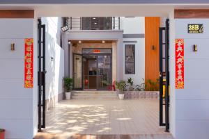 an entrance to a building with an open door at Central Phu Quoc Villa in Phú Quốc