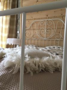 Posteľ alebo postele v izbe v ubytovaní Apartament KościeliSKI