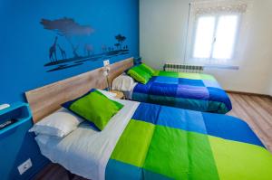 Posteľ alebo postele v izbe v ubytovaní Hostal La Pastora + 37 fotografií