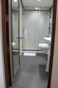 A bathroom at The Lotus Apartment Hotel, Venkatraman Street