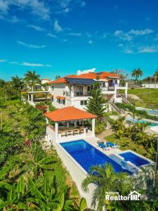 an aerial view of a house with a swimming pool at Casa Estrella, Relaxation Begins in Sosúa