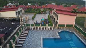 an overhead view of a resort with a swimming pool at Panorama Resort Oghuz in Oğuz