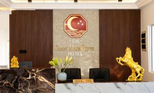 a lobby of the grand mumbai hotel with a reception desk at The Grand Moon River Hotel in Kataragama +50 photos