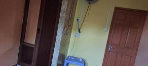 a room with a door and a wall with a door at CLAUDIA Blessings in Saint Gabriel