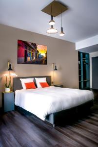 Postel nebo postele na pokoji v ubytování Atlas Hotel Brussels