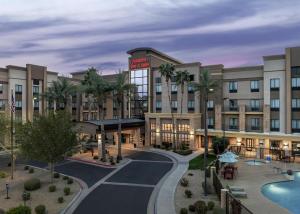 a rendering of a hotel with a pool at Hampton Inn & Suites Phoenix Glendale-Westgate in Glendale