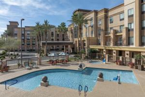 an image of a swimming pool at a hotel at Hampton Inn & Suites Phoenix Glendale-Westgate in Glendale