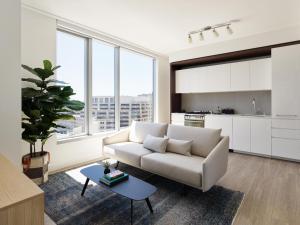 a living room with a couch and a table at Spera in San Francisco