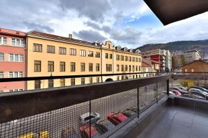a view of a building with cars parked on a balcony at BASC Modern 2 in Sarajevo