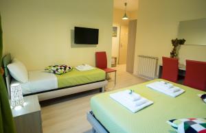 TV a/nebo společenská místnost v ubytování B&B Giunone