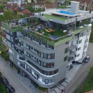 an aerial view of a building with a garden on it at Sremica in Vrnjci