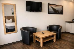Un televizor și/sau centru de divertisment la Charming Homes - Gästehaus Karin