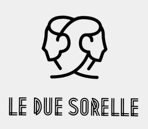 a logo of two people with the words he blue scourge at Le Due Sorelle in Savio di Ravenna