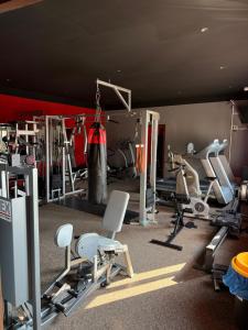 a gym with a bunch of chairs and machines at Dolnośląski in Ząbkowice Śląskie
