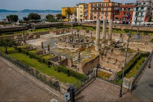 an aerial view of the ruins of a building at Il Cas8tto in Pozzuoli
