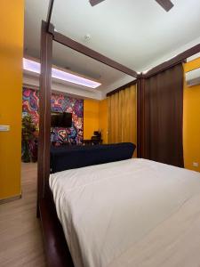 a bedroom with a bed in a room at The Nest Lucknow in Lucknow