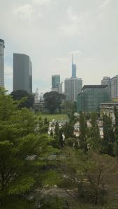 a view of a city with trees and buildings at My Hotel @ Sentral in Kuala Lumpur