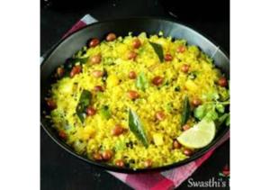 a pan filled with rice with beans and vegetables at The Riviera Hotel Pahalgam in Pahalgām