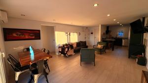 a living room with a table and a couch at Las Colinas in Illana