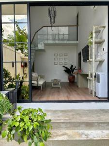 a view of a living room from inside a house at Gauri Vasanta Villa with Private Pool Yogyakarta in Yogyakarta