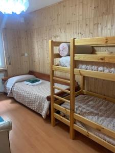Llit o llits en una habitació de Rustichello