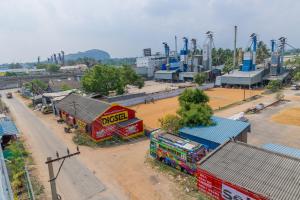 an aerial view of a factory with buildings and a street at P V Grand in Dindigul