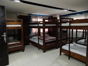 a group of bunk beds in a room at YMCA of Manila Hostel in Sampong