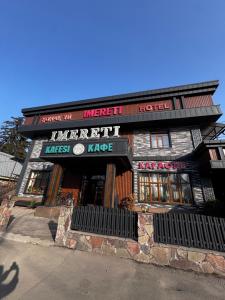 a hotel next to a street at Imereti in Almaty