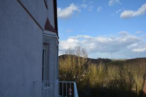 a window of a building with a view of a mountain at Zur Eresburg in Marsberg