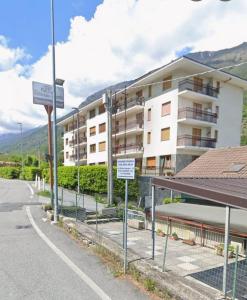 an empty parking lot in front of a building at Casa Pioda in Chiomonte