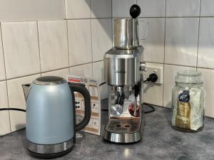 a coffee maker sitting on top of a counter at Daisy Cottage on Duke 1BR in Yarram