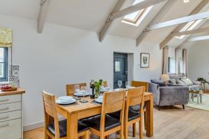 a dining room and living room with a table and chairs at 3 Bed in Hayle oc-78551 in Hayle +31 photos