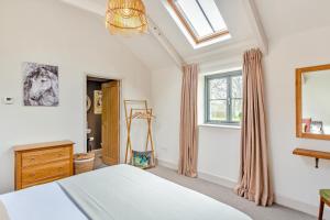 a bedroom with a bed and a window at 3 Bed in Hayle oc-78551 in Hayle