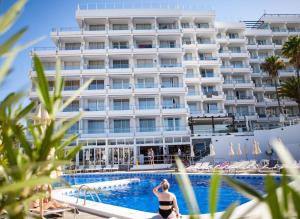 a view of the hotel from the pool at Coral Ocean View - Adults Only in Playa de las Americas