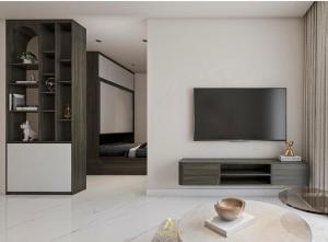 a living room with a television on a wall at VHGP-Bs10 in Long Bình