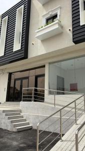 a building with a staircase in front of it at Pure Stay House in Taif
