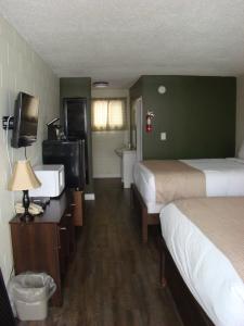 Postel nebo postele na pokoji v ubytování Paddock Inn