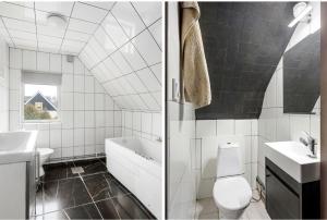 a white bathroom with a sink and a toilet at حورية البحر in Bromölla +10 photos