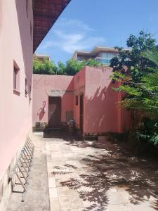 an empty courtyard of a house with a building at Flat Beach Park in Aquiraz