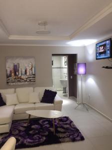 TV a/nebo společenská místnost v ubytování Malika Apartments