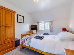 a bedroom with a large bed and a window at 2 Bed in Ashbourne oc-82579 in Longford