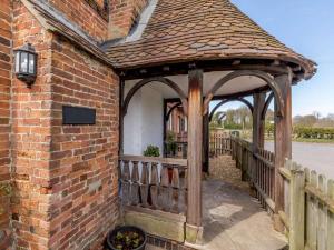 a gazebo on a brick building with a fence at 2 Bed in Ashbourne oc-82579 in Longford
