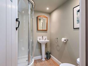 a bathroom with a shower and a sink at 2 Bed in Bakewell oc-61862 in Baslow +12 photos