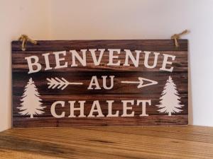 a sign that readsineave au chater hanging on a wall at Chalet Byzance by Interhome in Nendaz +35 photos