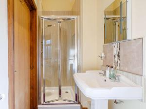a bathroom with a sink and a shower at 3 Bed in Consett oc-29403 in Lanchester +26 photos