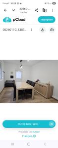 a webpage of a room with a table and a couch at Villa chez Fred in Le Quesnoy