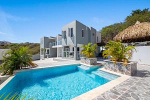 an image of a villa with a swimming pool at Casa Tortuga, Relaxed house for Family & Friends on Grote Berg, Curaçao in Grote Berg